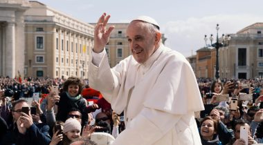 Pope Francis greets a crowd in Vatican City - UNSPLASH Pope Francie greets a crowd in Vatican City